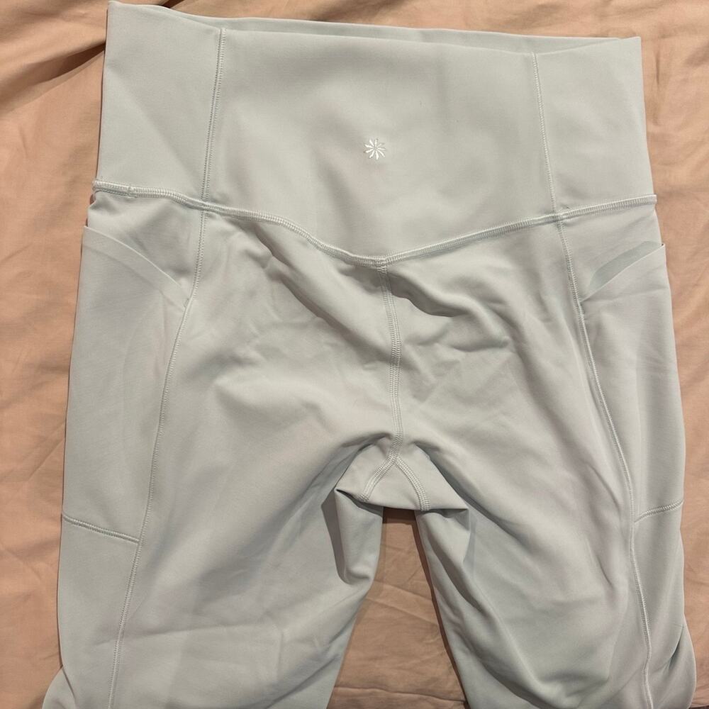 Athleta Salutation Stash 7/8 Tight